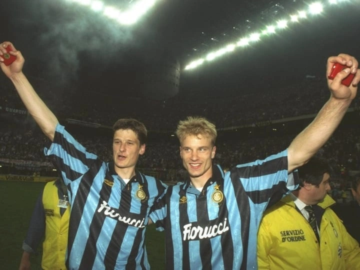 Dennis Bergkamp and Wim Jonk of Inter Milan