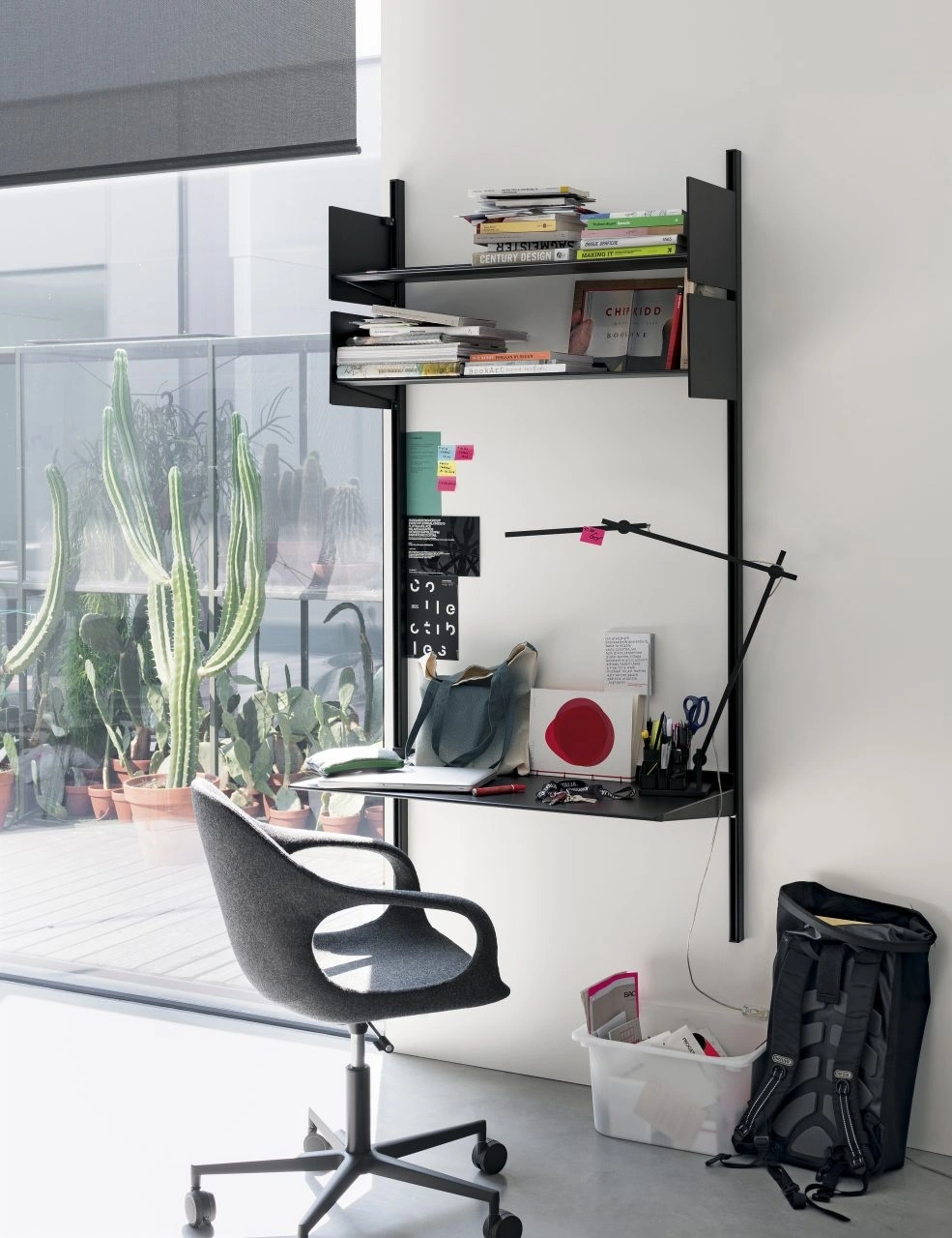 Dot, a versatile system of sheet metal shelves and aluminum uprights.