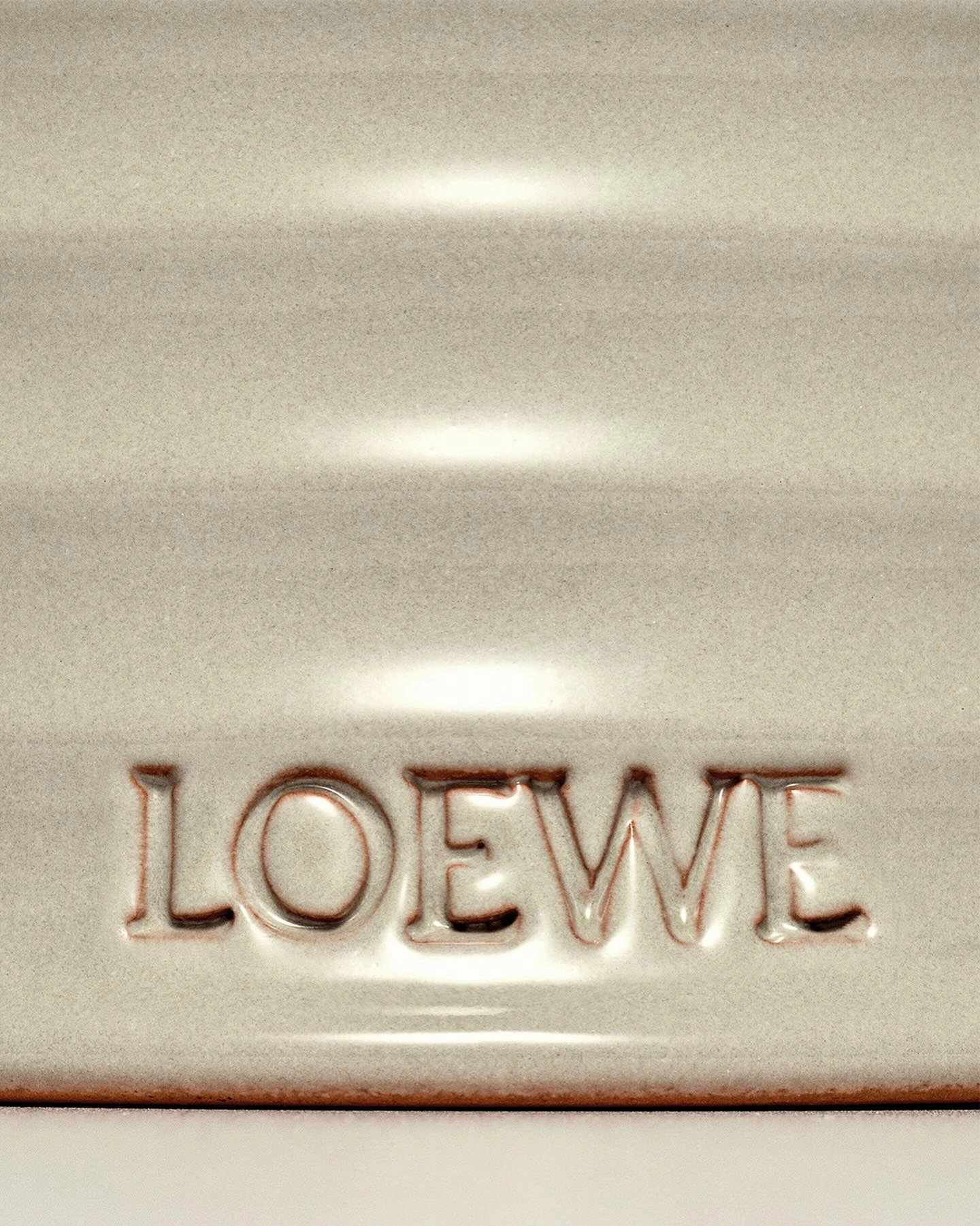 Photo shared by LOEWE Perfumes on February 17, 2024 tagging @loewe, @jonathan.anderson, and @loewe_perfumes. May be an image of kitchenware and text that says 'LOEWE'.