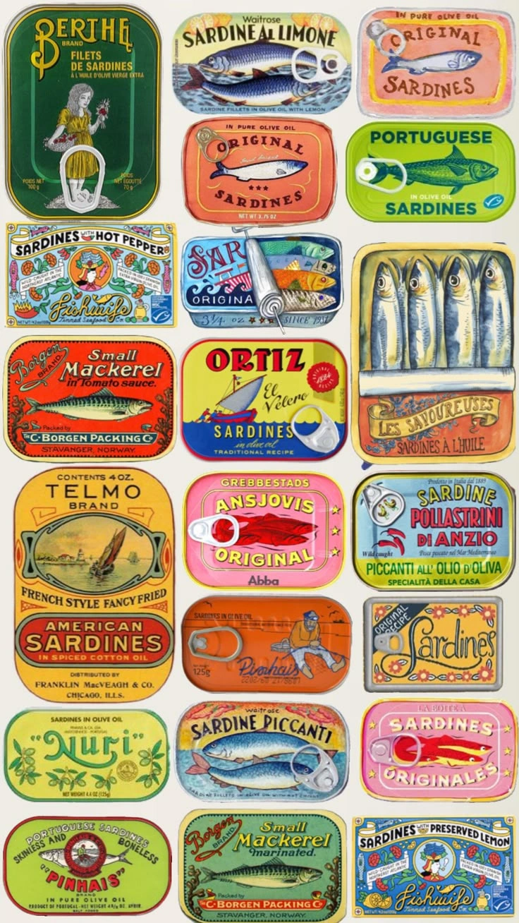 This may contain: an assortment of different types of fishing lures in tins and labels on white paper