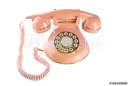 Pink retro telephone isolated on a white