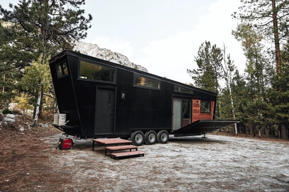 land-ark-rv-used-cumarua-renewable-brazilian-hardwoodfor-the-deck-and-the-inset-siding-of-this-tiny-homes-exterior-the-deck-can-be-raised-and-lowered-for-transport-in-two-minutes-via-an-interior-switch