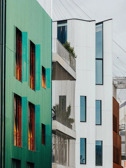 Mole Architects’ Rhomboid building (D2) at left, HNNA’s C3 on the right