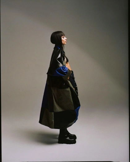 Photo by LA Models on April 25, 2023. May be an image of 1 person, overcoat and cloak.