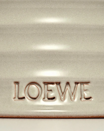 Photo shared by LOEWE Perfumes on February 17, 2024 tagging @loewe, @jonathan.anderson, and @loewe_perfumes. May be an image of kitchenware and text that says 'LOEWE'.