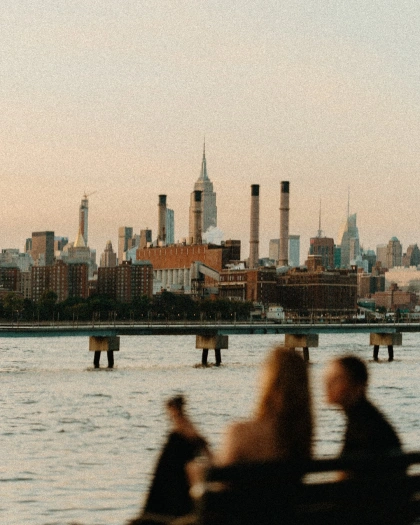 Photo by TJ Park on September 22, 2024. May be an image of 3 people, barge, the Brooklyn Bridge, skyscraper, the Queensboro Bridge and buildings.