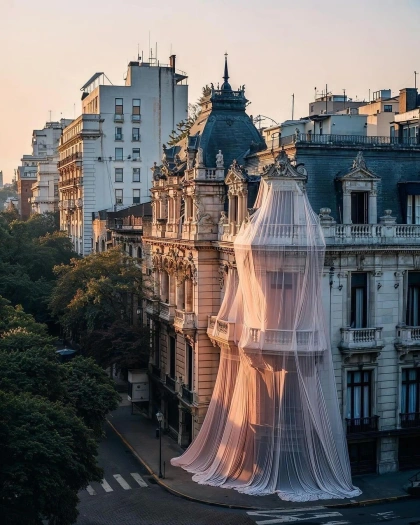 Photo by HENI on November 15, 2024. May be an image of La Sagrada Familia, Sacré-Cœur, the Place de la Bastille, tower, lamppost, buildings and fountain.