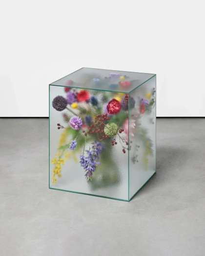 Photo by Marius Boekhorst on December 10, 2025. May be art of vase, box and text.